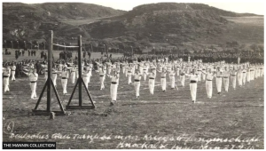 Joseph Pilates taught his techniques to many of the 23,000 men interned at the Knockaloe site
Image dated 27/09/1915 of internees doing pilates in a field at the Knockaloe camp.